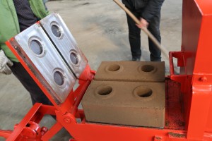 Hand press brick making machine